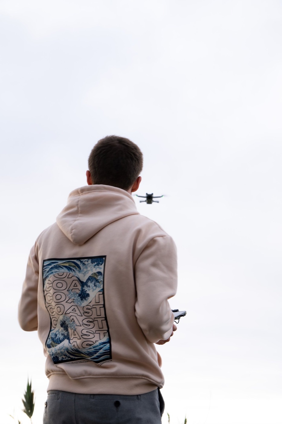 Jan flying a drone on location